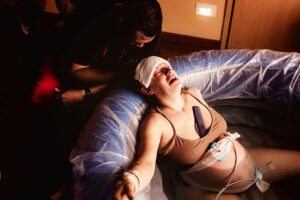 Richmond, Virginia birth photographer, mom in birth tub crying