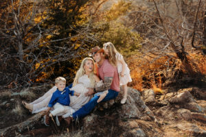 Lawton photographer, Pregnant mama sitting with husband and two children in Wichita Wildlife Refuge