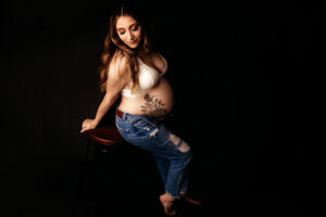 Richmond pregnant mama in bra and jeans in studio